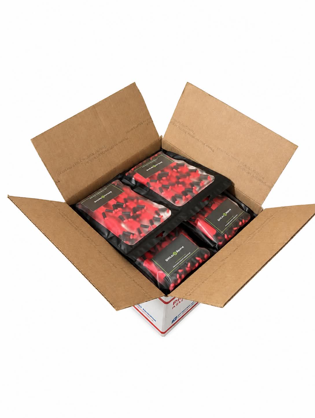 Open cardboard box containing our Bloom Pulse Rose Shine Spine branch spreaders on a white background.